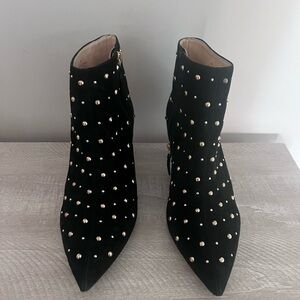 Kate Spade Black and Gold Ankle Booties with Sleek Silhouette